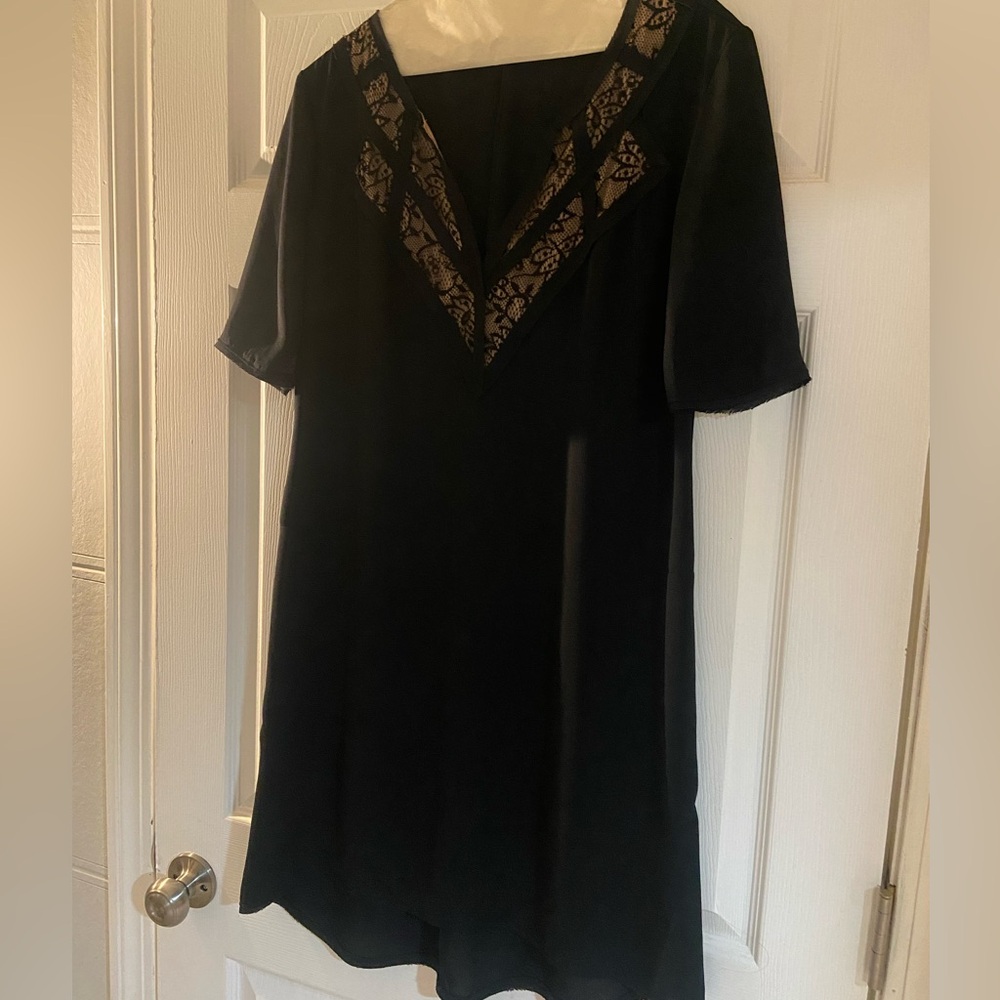 BCBG Maxazria black sheath dress with detailed neckline. Size S